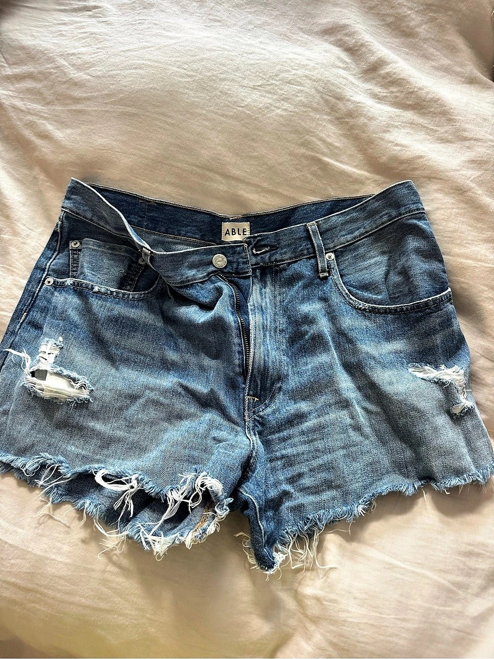 ABLE Distressed Denim Jean Shorts in Blue